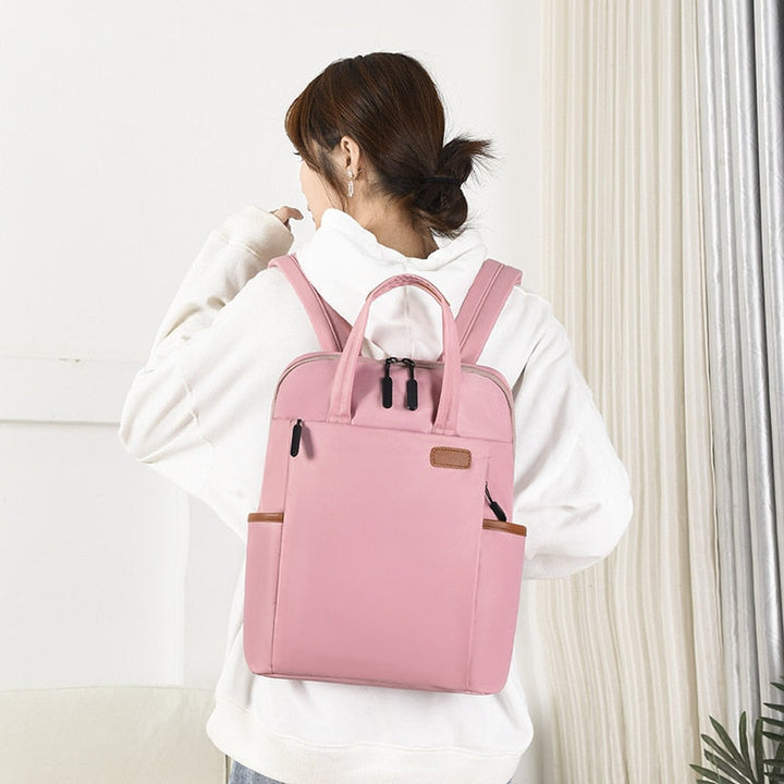 Secure anti-theft women's travel backpack. Water-resistant Oxford design for safe carrying of valuables.