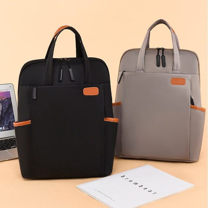 Water-resistant women's travel backpack. Lightweight anti-theft design, perfect for all weather travel & commute.