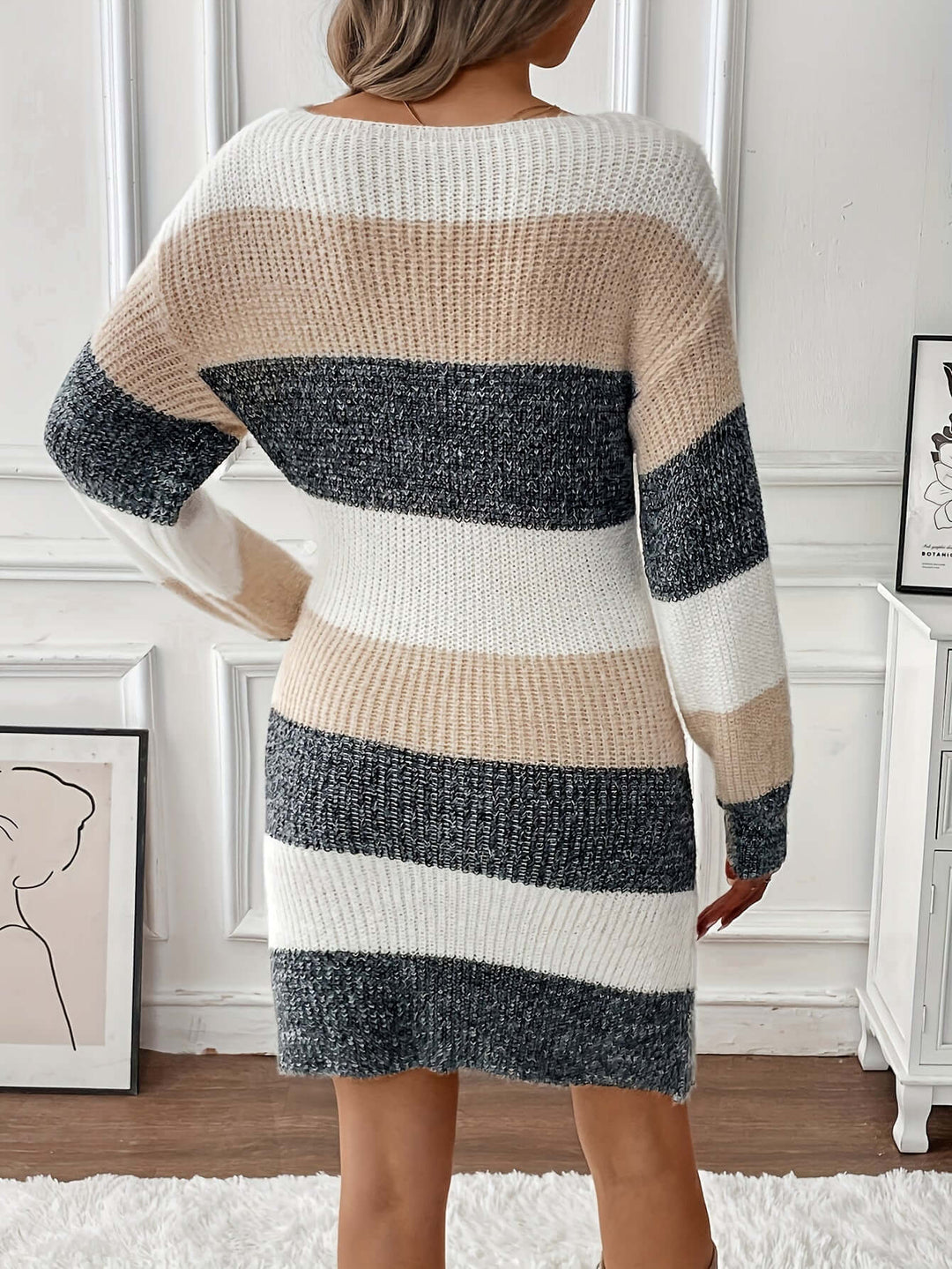 Comfortable women's apricot striped knitted sweater dress, perfect for casual fall wear.