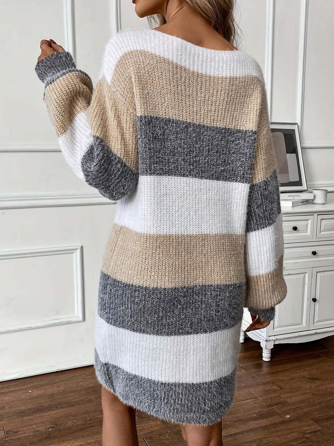Stylish apricot striped knitted sweater dress for women, cozy and versatile fall clothing.