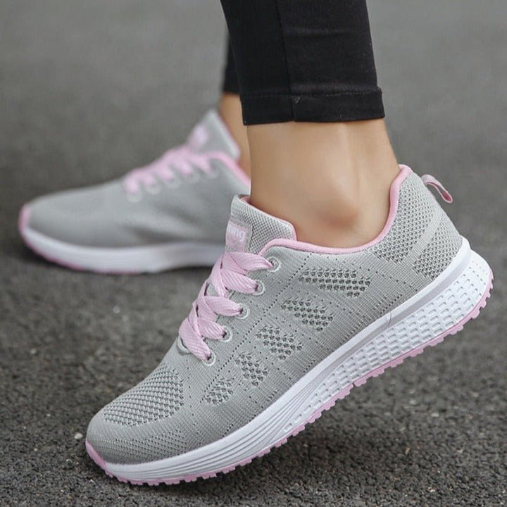 Back view of Women's Slip-Resistant Sneakers, focusing on the durable heel and traction