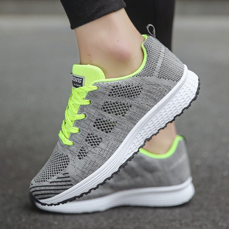 Women's Arch Support Walking Sneakers in a studio shot, emphasizing their sleek, modern look