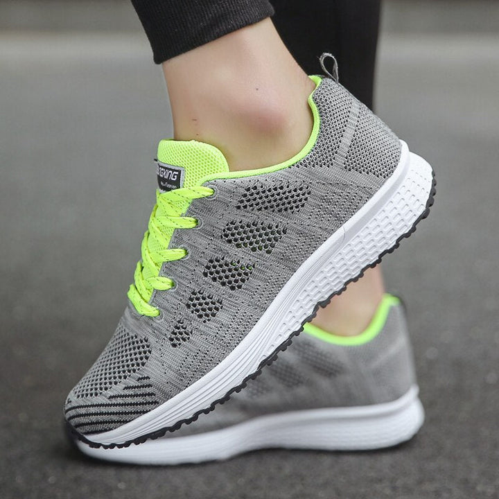 Women's Arch Support Walking Sneakers in a studio shot, emphasizing their sleek, modern look