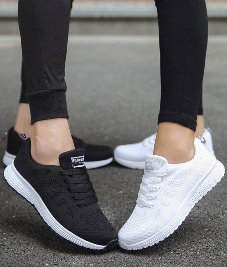 Pair of Women's Arch Support Athletic Shoes on a white background, highlighting product details