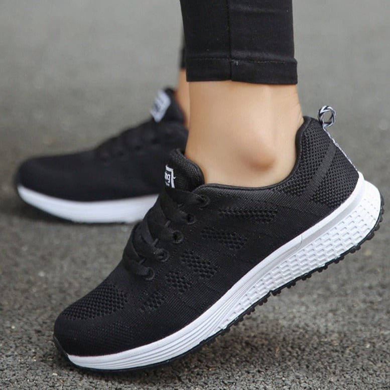 Detailed shot of breathable knit upper on Women's Comfortable Sneakers, ensuring ventilation