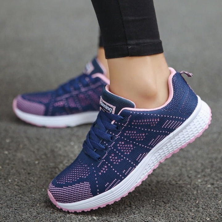 Model wearing Women's Arch Support Walking Sneakers during a brisk walk, emphasizing comfort
