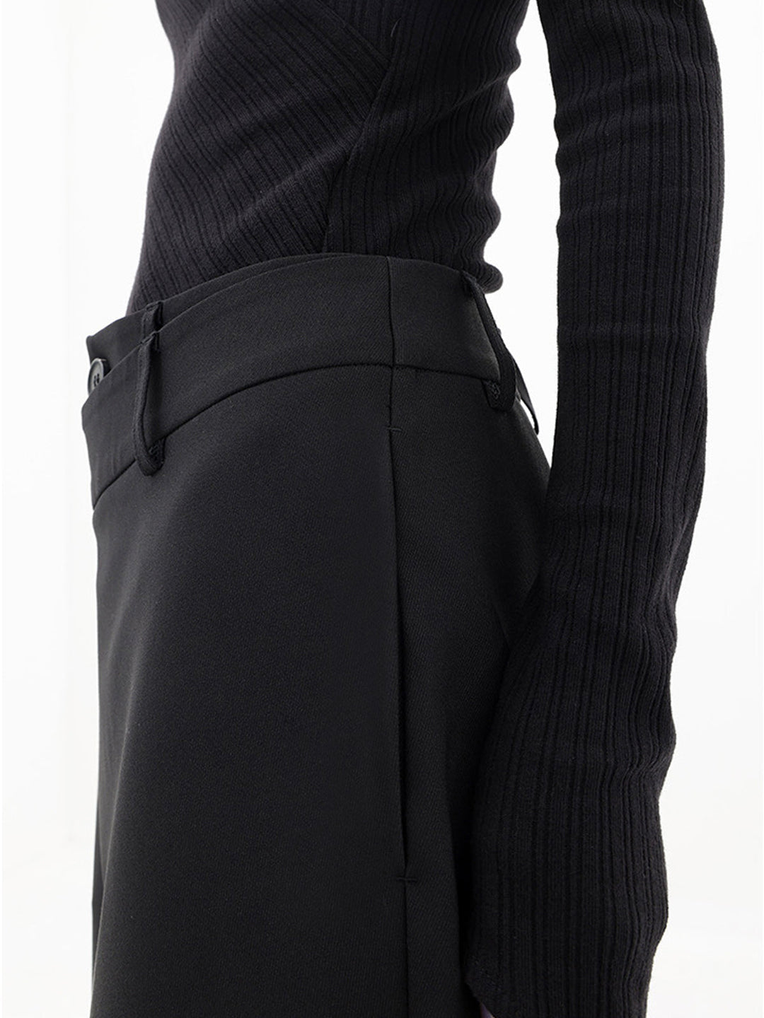 Versatile women's asymmetrical pants, relaxed fit, suitable for both casual and dressy elegant occasions.