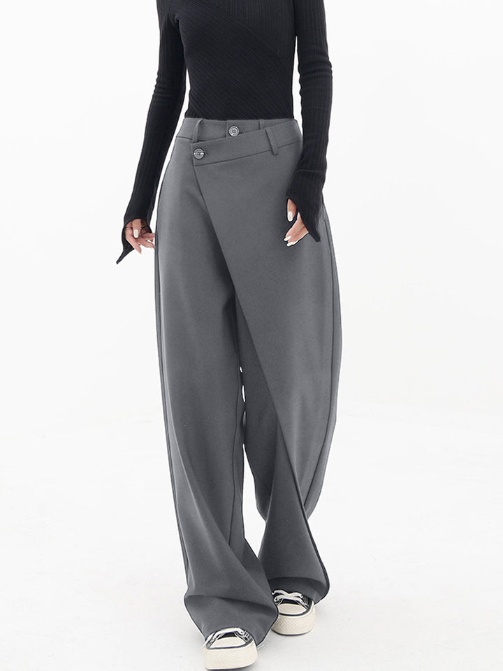 Stylish women's trousers with an asymmetrical cut and comfortable relaxed fit, a fashionable choice.
