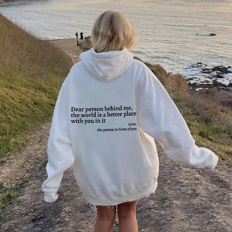Women's Aurora graphic hoodie with uplifting message. Stylish, comfortable pullover for casual wear.
