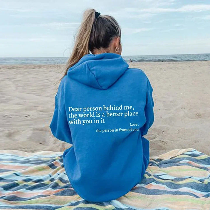 Stylish Aurora women's hoodie with positive message. Long sleeve pullover, great for street style.