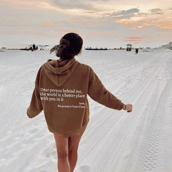 Women's casual Aurora hoodie, "Spread Positivity" message. Cozy, long sleeve for autumn fashion.