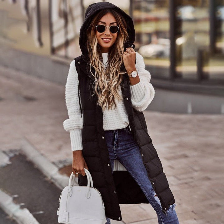 Women's Aurora knee-length quilted bodywarmer vest, a stylish and warm fall layering piece for outerwear.