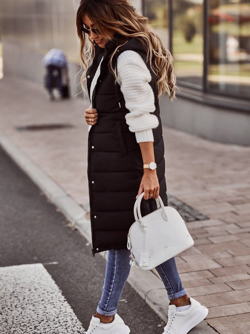 Chic Aurora women's knee-length quilted vest, perfect outerwear for fall fashion and winter layering comfort.