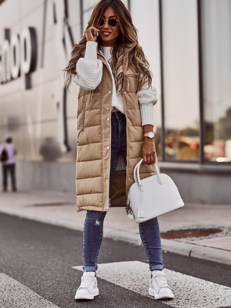 Women's Aurora quilted sleeveless jacket, knee-length design perfect for fall fashion and comfortable layering.