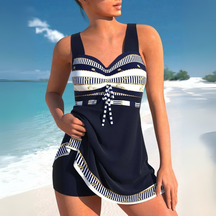 Elegant two-piece women's Aztec print swimdress. Ruched tankini top & skirted bottom for beachwear & pool.