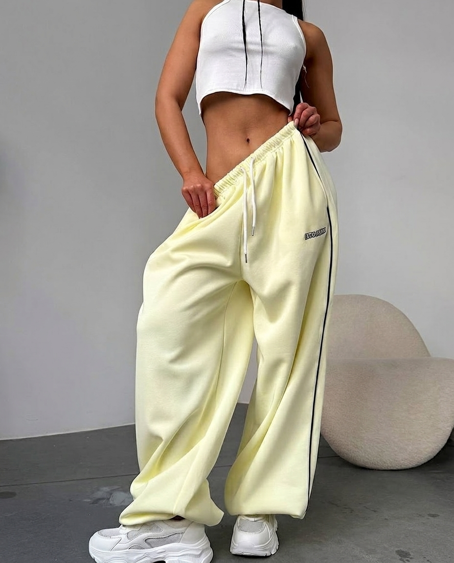 Everyday comfortable women's sweatpants, baggy wide leg style, featuring a chic side stripe design.