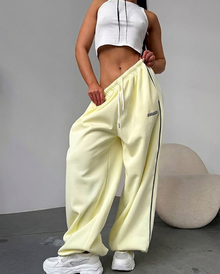 Everyday comfortable women's sweatpants, baggy wide leg style, featuring a chic side stripe design.