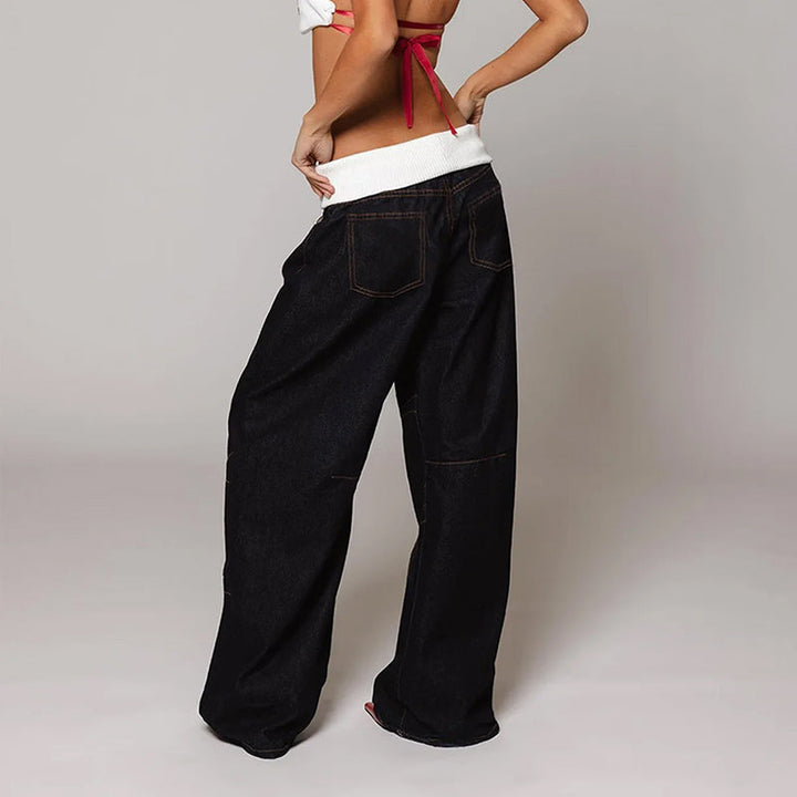 Modern women's wide leg jeans with a relaxed, baggy fit. Ideal trendy bottoms for casual comfort.