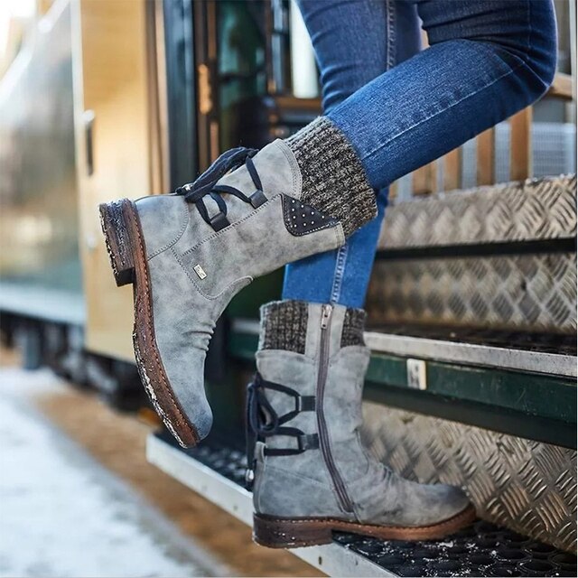 Stylish women's Bianca mid-calf snow boots with warm lining. Fashionable & comfortable winter footwear.