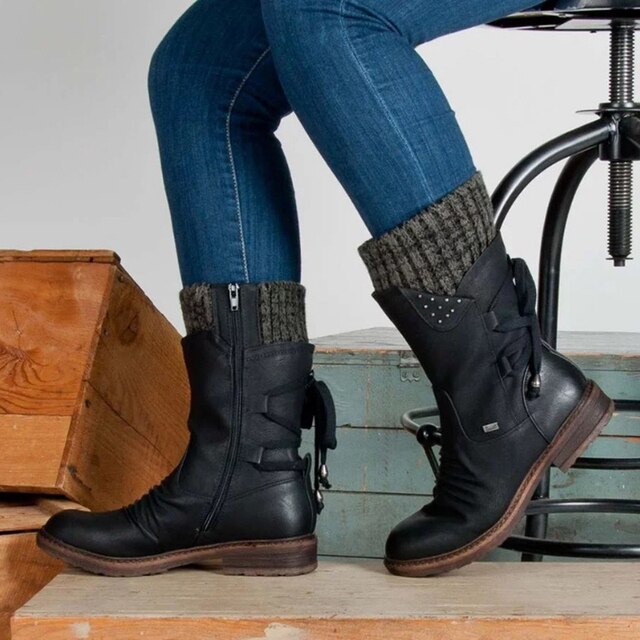 Bianca women's mid-calf snow boots, ideal for warmth & style in winter. Durable, cozy cold weather boots.