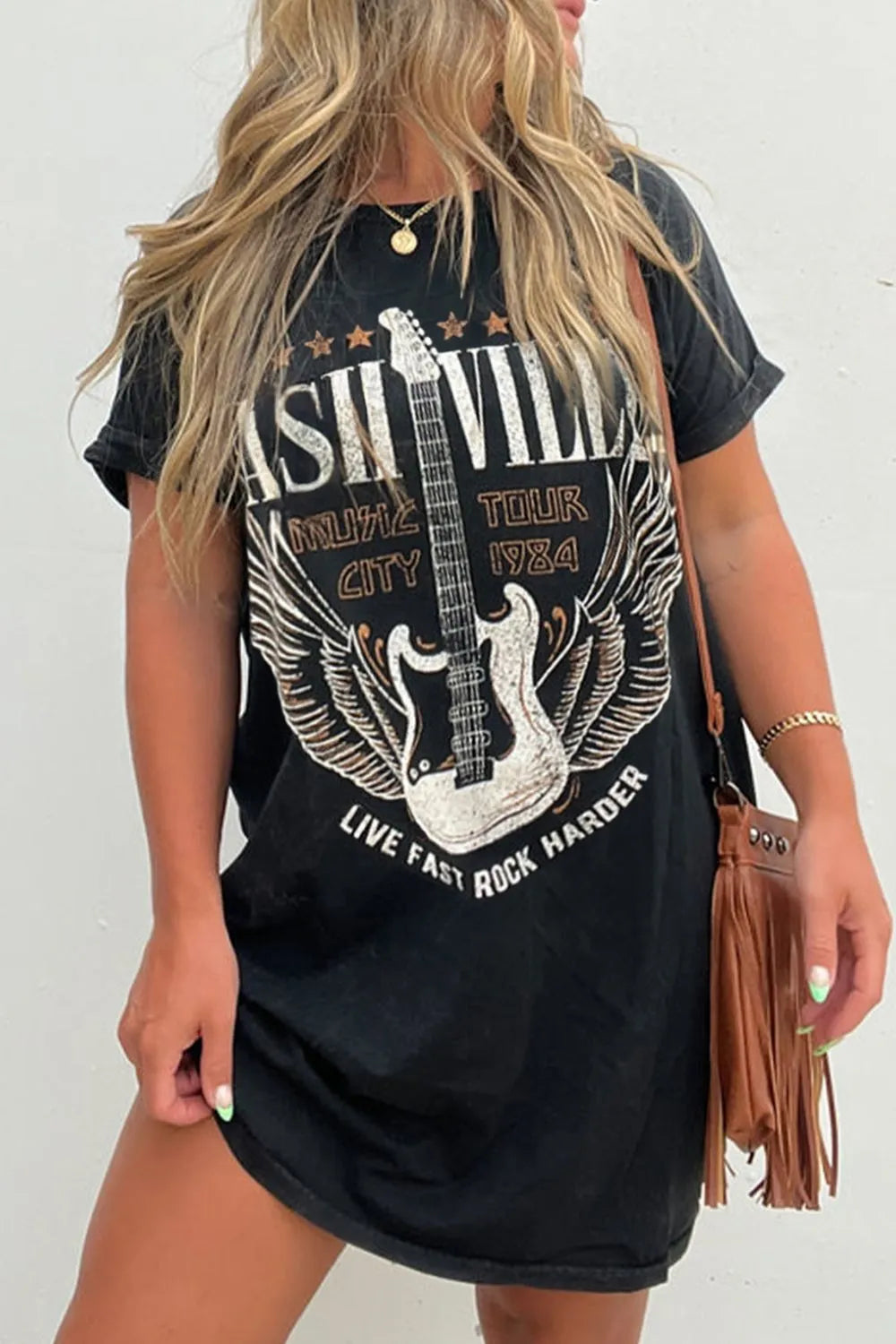 Women's black edgy graphic tee mini dress, short sleeve, relaxed fit, perfect for casual summer style & comfort.