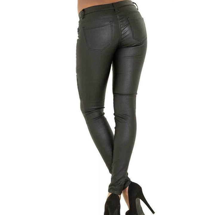 Edgy black faux leather skinny jeans for women. Comfortable stretch pants, fashionable & chic for any outfit.
