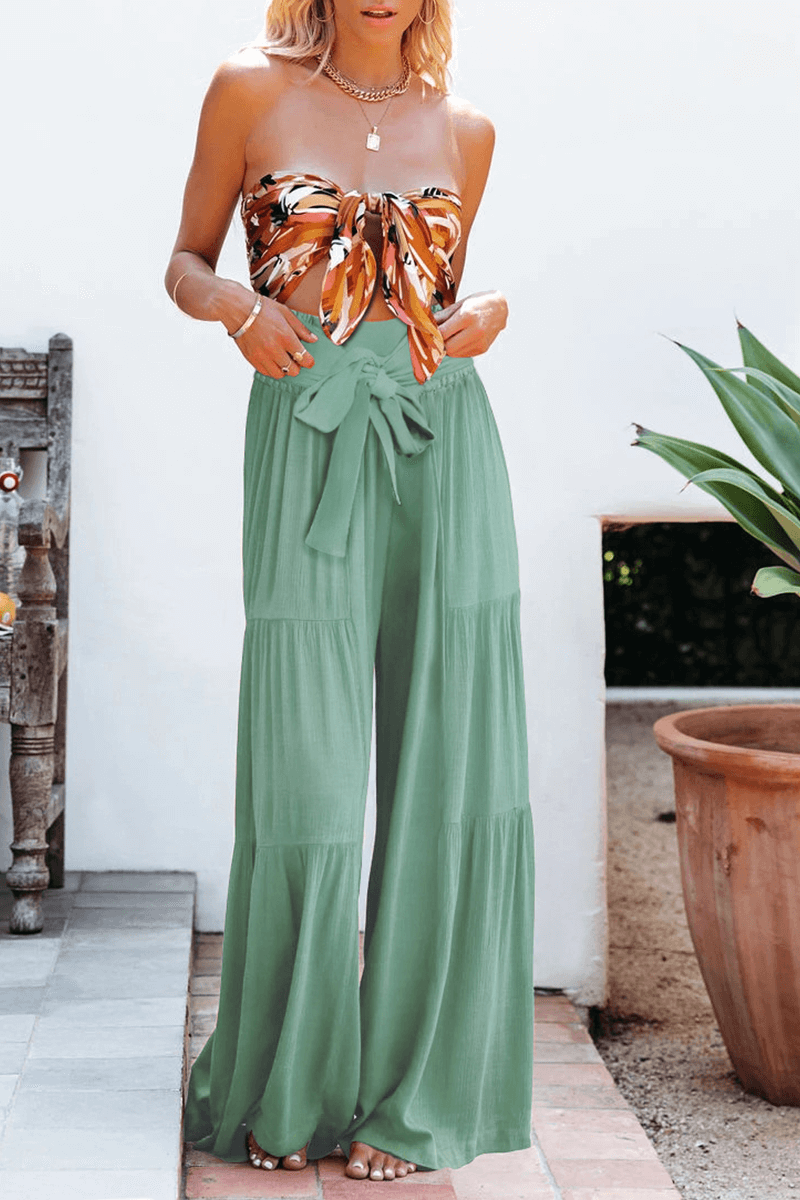 Elegant flowy wide leg pants for women, high waist, perfect for sophisticated casual wear.