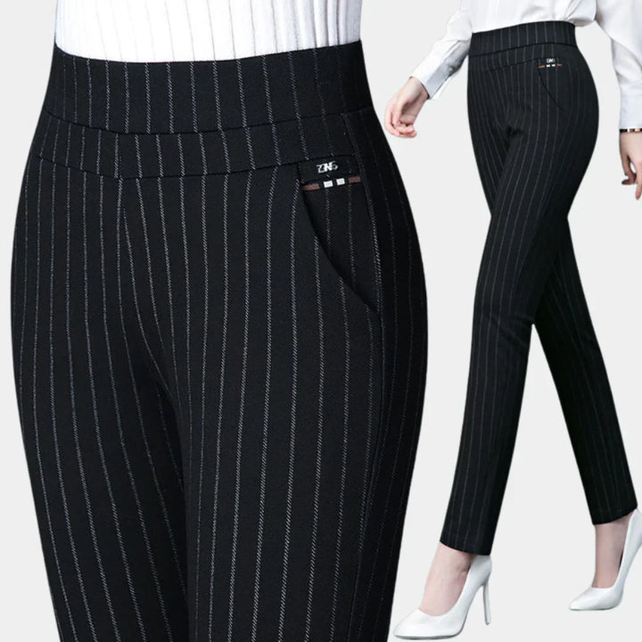 Women's black high-waisted stretch trousers, designed for ultimate comfort and versatile everyday wear. Ideal for office or casual.