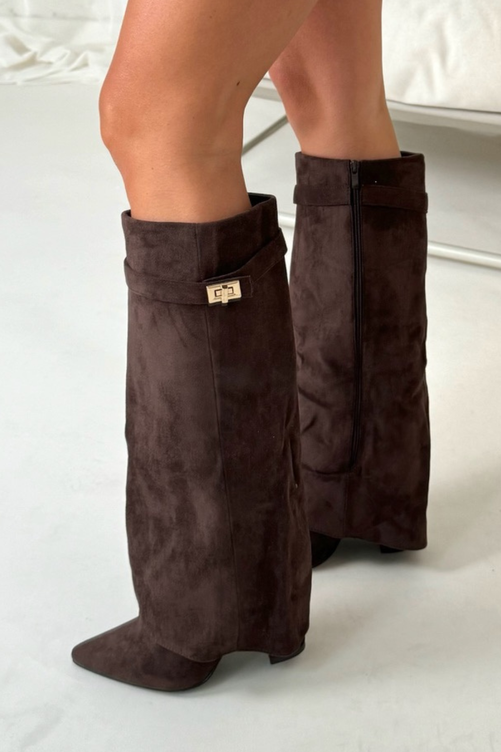 Versatile women's knee-high block heel boots with pointed toe and side zipper; great for elegant fashion.