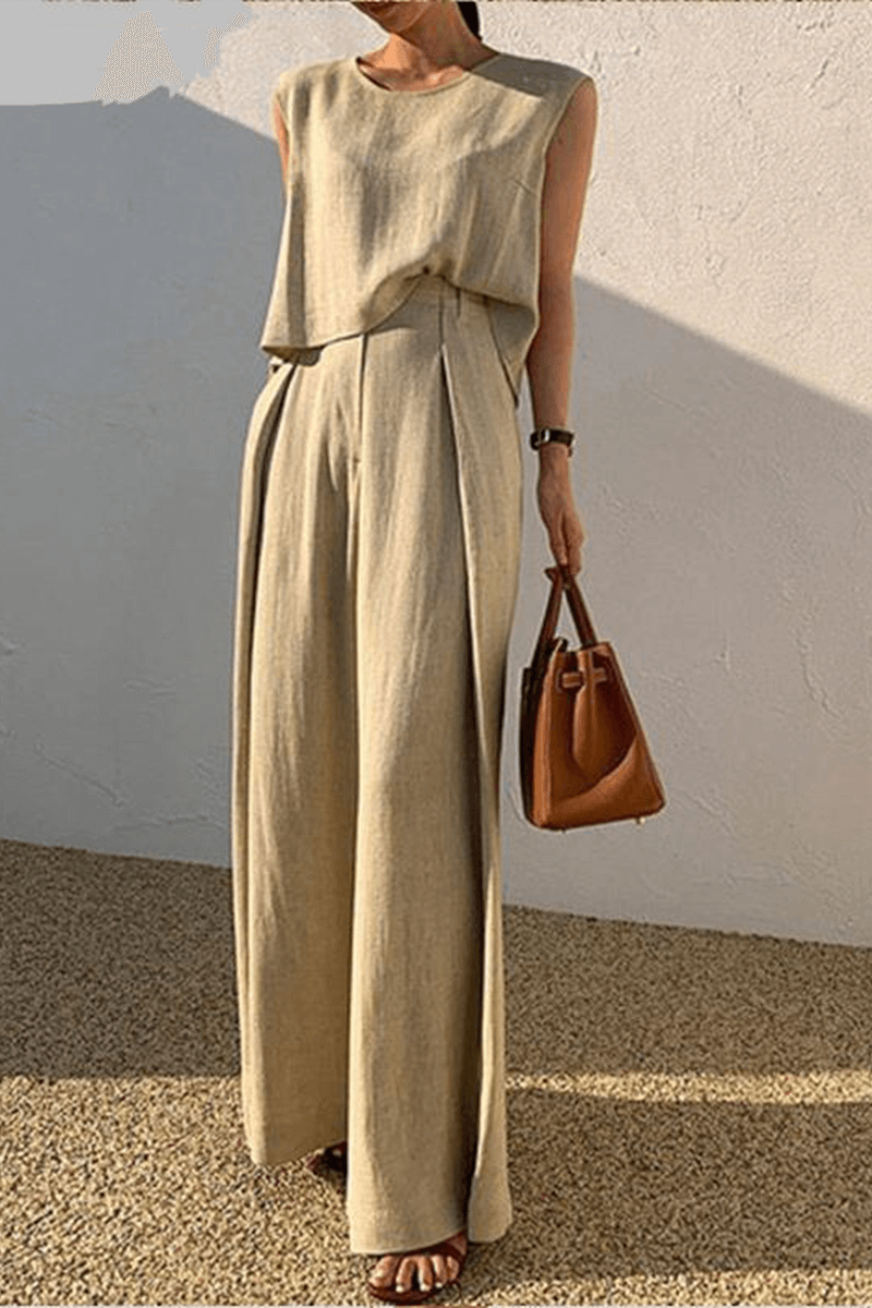 Women's black loose-fit minimalist two-piece set with wide-leg pants. Comfortable and chic casual loungewear.