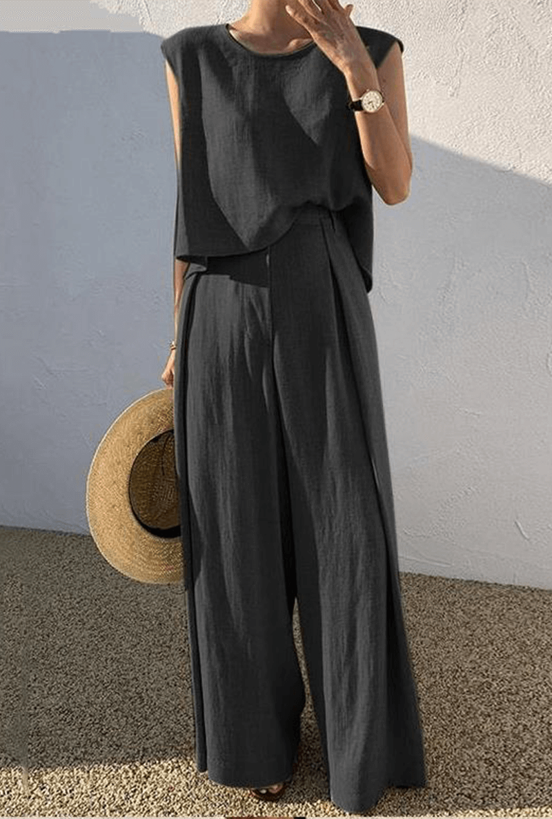 Khaki women's loose-fit minimalist two-piece set. Comfortable wide-leg pants and top for loungewear or casual chic.