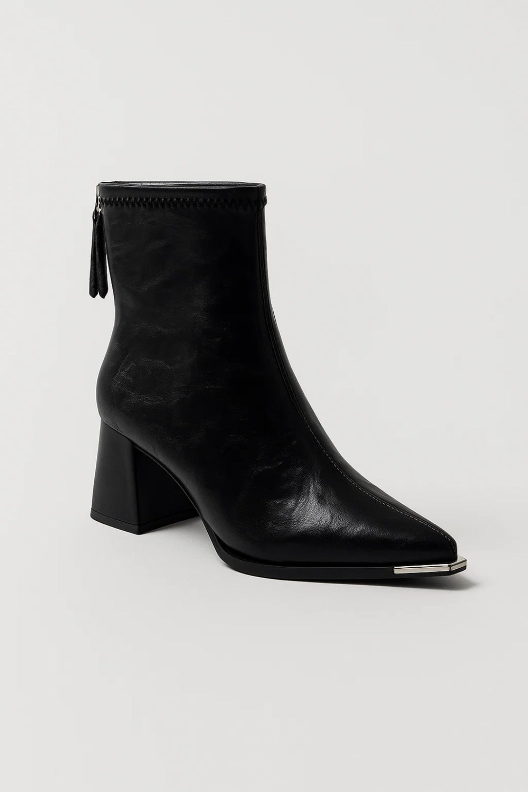 Elegant women's beige block heel ankle boots. Versatile & comfortable, perfect for stylish everyday or office wear.