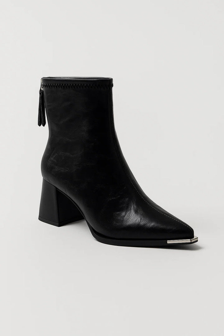 Elegant women's beige block heel ankle boots. Versatile & comfortable, perfect for stylish everyday or office wear.