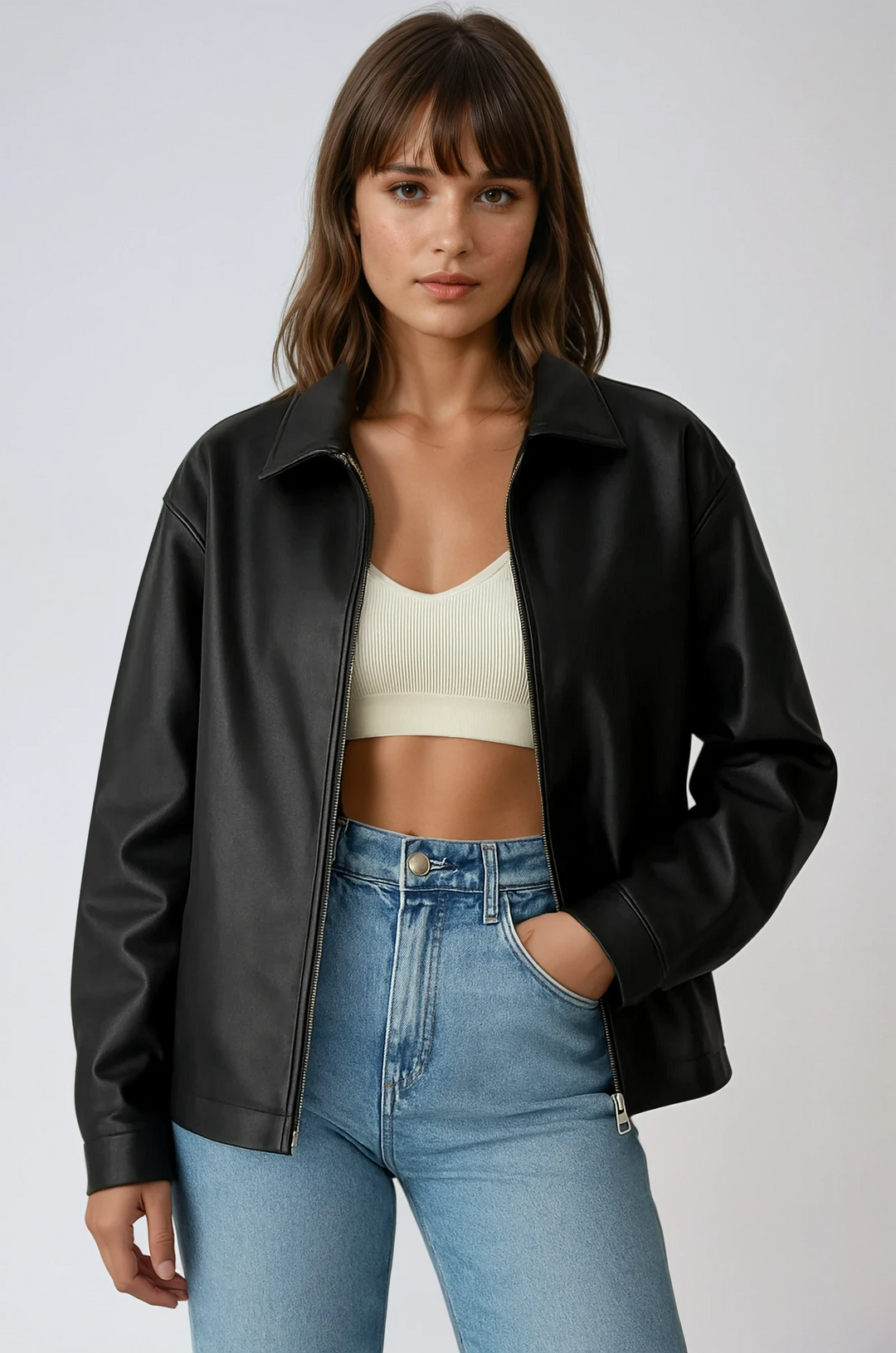 Women's black moto style zip-up jacket. Edgy, versatile outerwear for fashion-forward women.