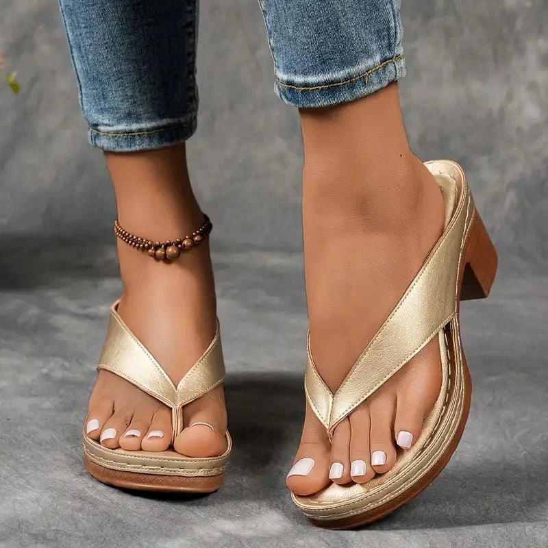Women's black orthopedic low heel sandals with arch support for all-day comfort.