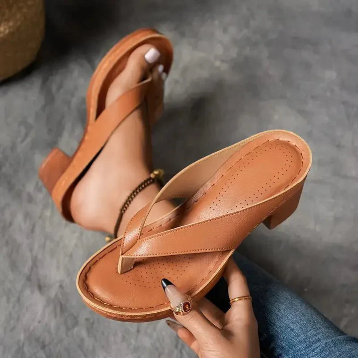 Women's casual black low heel sandals, providing orthopedic comfort and arch support.