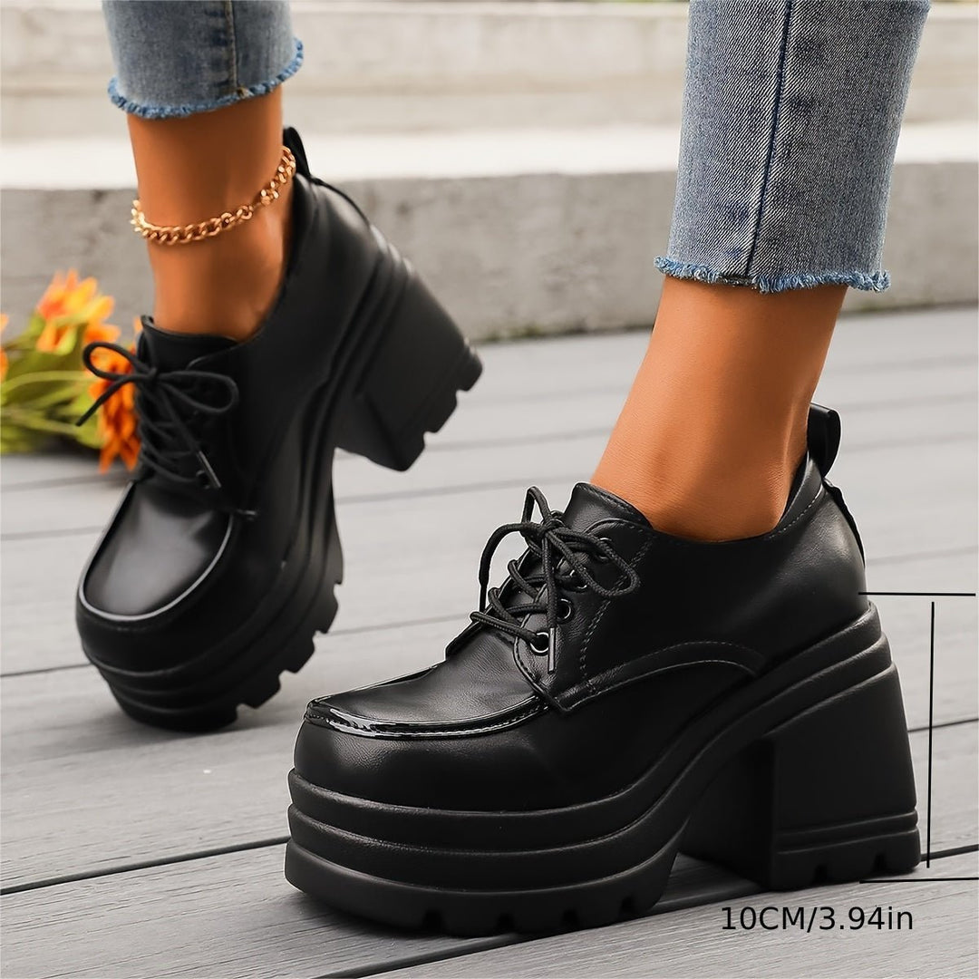 Women's black platform oxfords, chunky heel, perfect blend of retro style and modern comfort.