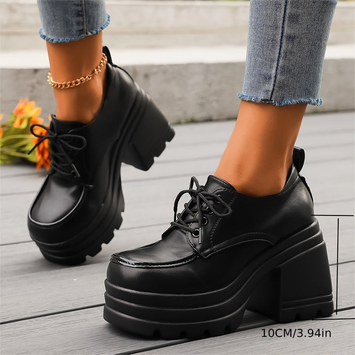 Women's black platform oxfords, chunky heel, perfect blend of retro style and modern comfort.