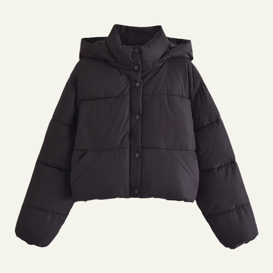 Fashionable black women's puffer jacket, an insulated and warm winter coat for stylish outerwear.
