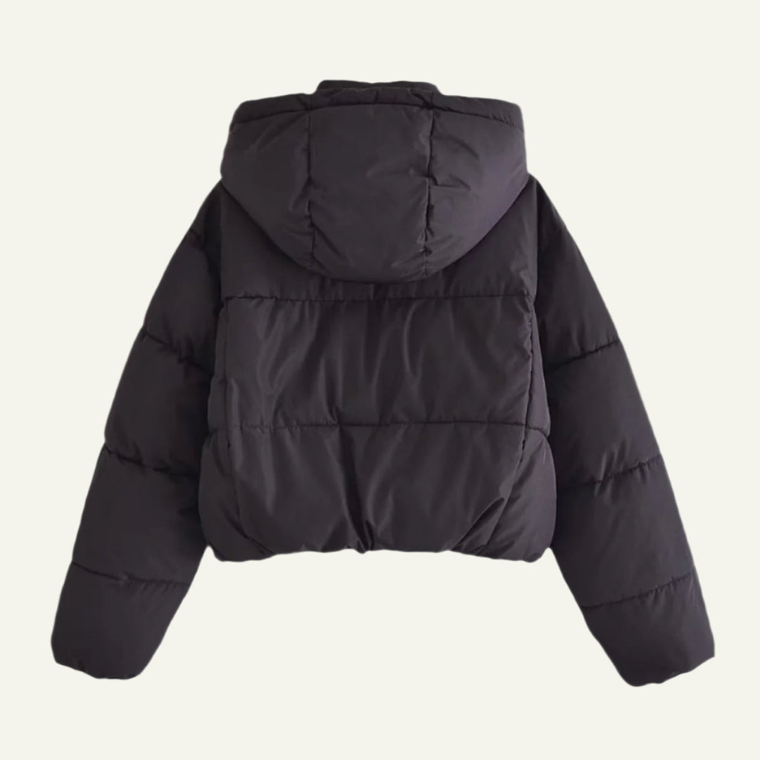 Warm and lightweight black women's puffer jacket, a versatile winter coat for everyday style.