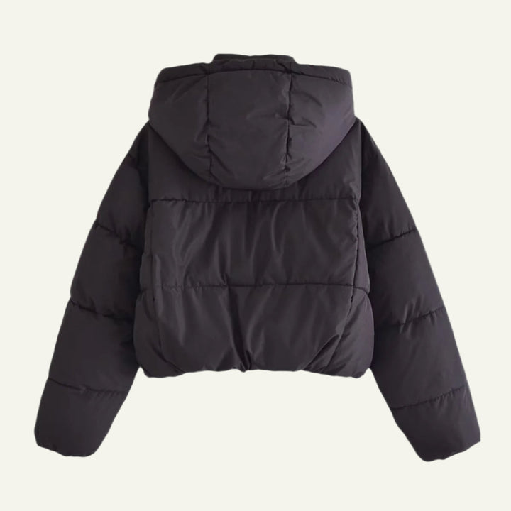 Warm and lightweight black women's puffer jacket, a versatile winter coat for everyday style.