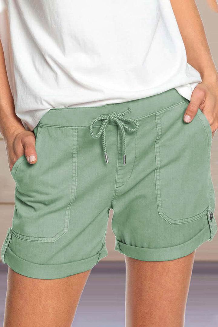 Fashionable women's relaxed fit shorts with drawstring, perfect bottom for summer casual wear.