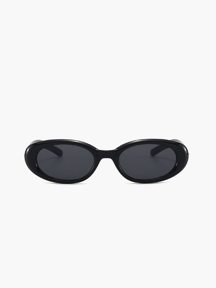 Vintage-inspired black oval sunglasses for women, perfect eyewear with full UV protection.