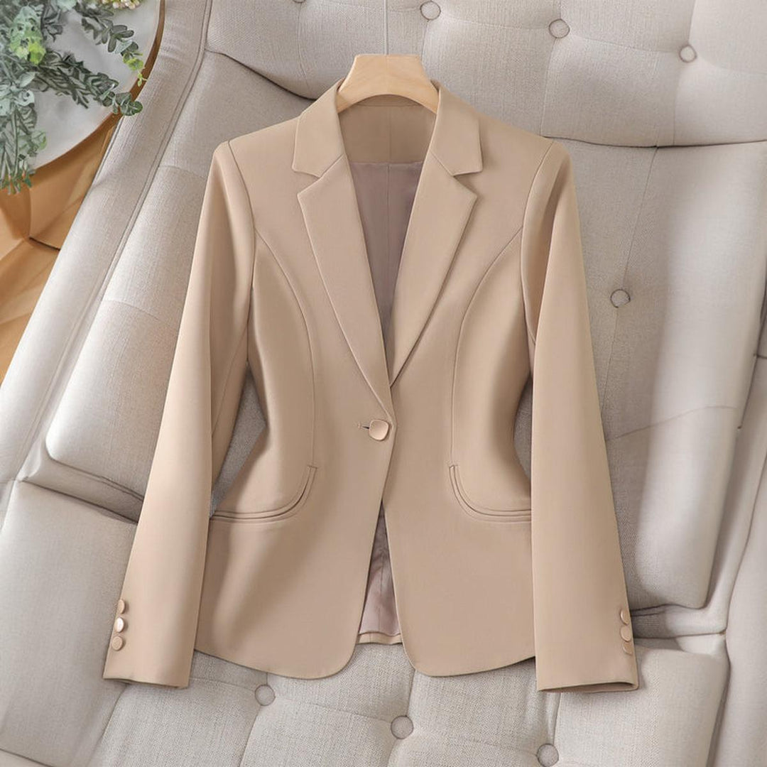 Professional women's blazer. Slim fit, single-button closure, and notched lapel collar for a chic look.