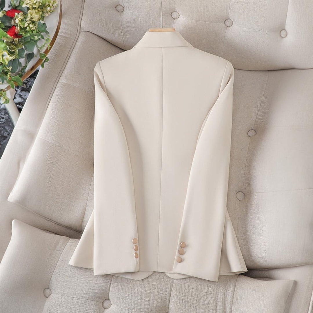 Modern women's tailored blazer. Slim fit, lapel collar jacket for elegant business casual and office fashion.
