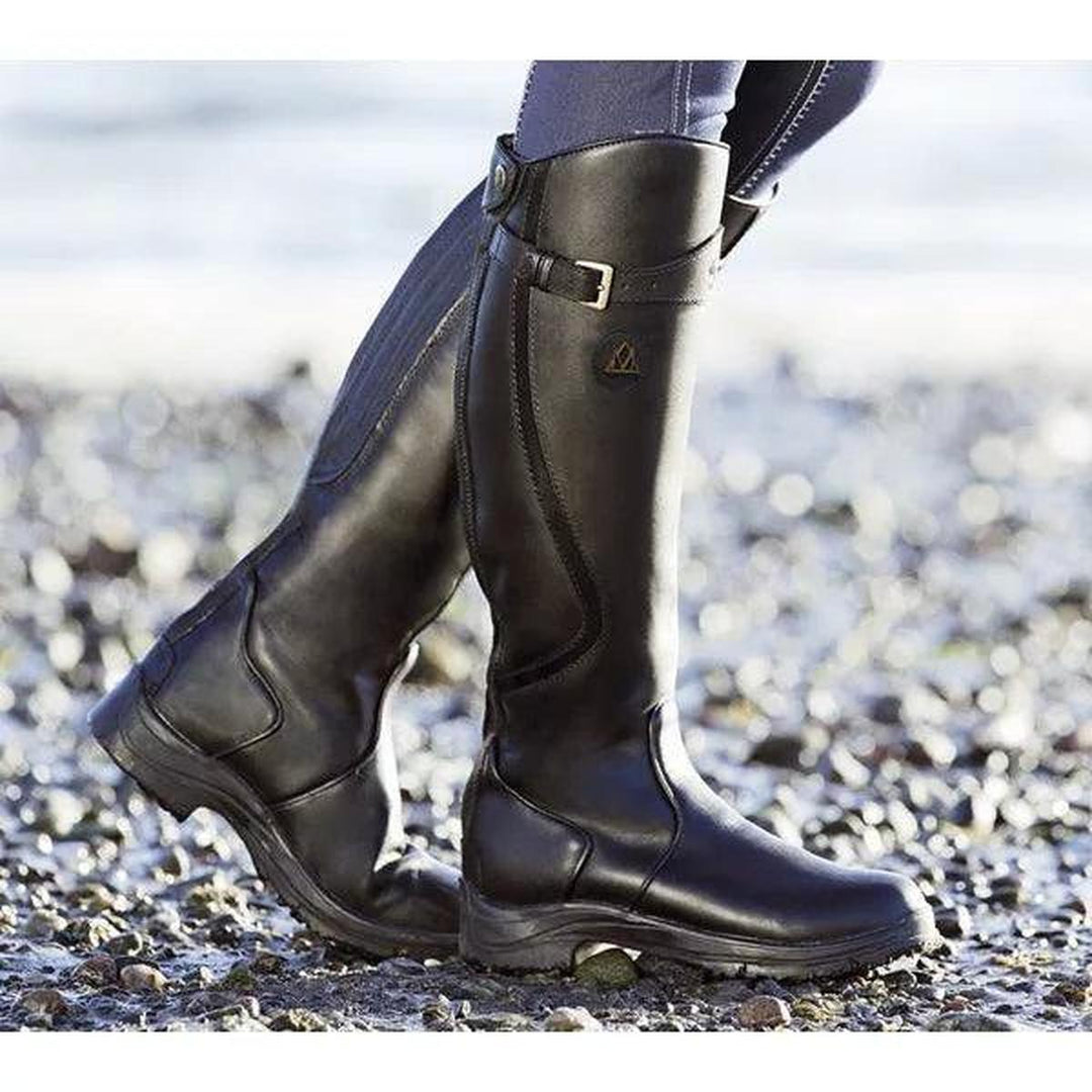 Stylish women's tall winter riding boots, waterproof & fashionable for equestrian wear or casual outfits.