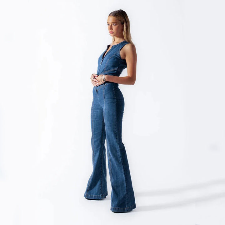 Fashionable women's blue denim jumpsuit, a versatile one-piece with a flattering fit for stylish comfort.