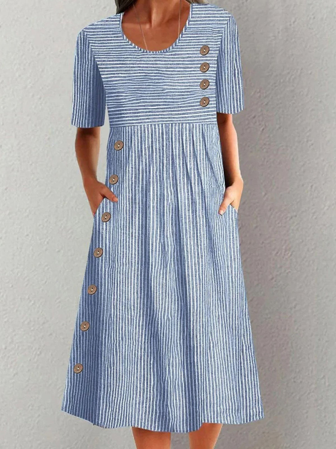 Women's blue relaxed fit striped midi dress with short sleeves, perfect for a comfortable casual summer look.