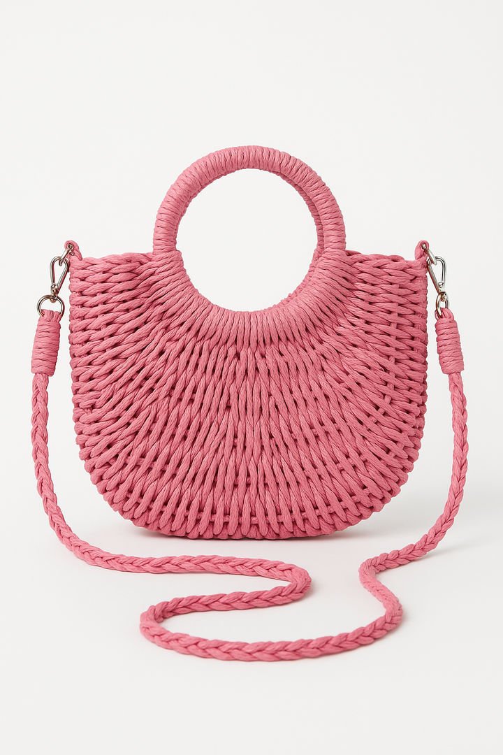 Bohemian women's circular straw handbag, a versatile summer fashion accessory & beach bag for vacation.