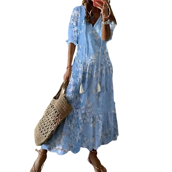 Comfortable women's floral maxi dress in bohemian style. Great for summer days, casual wear, and vacation outfits.
